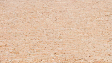 Fototapeta premium Pink brick texture background with repeating pattern