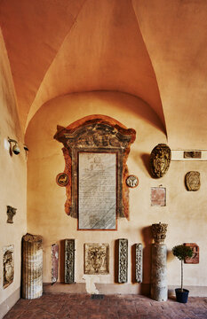 collection of historical architectural elements at Palazzo Baldeschi Cennini, built in the 14th century in Perugia, Italy, Europe 