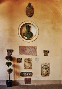 collection of historical architectural elements at Palazzo Baldeschi Cennini, built in the 14th century in Perugia, Italy, Europe 