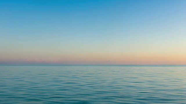 Serene Horizon: The image shows a serene ocean merging seamlessly with a tranquil sky, exhibiting a sense of calm and limitless possibilities.