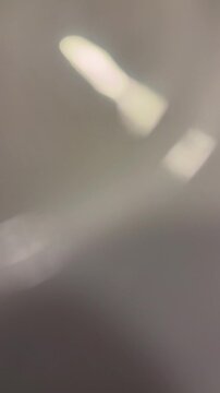 Abstract light and shadow bokeh background with subtle motion