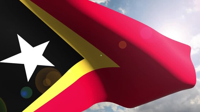 East Timor Flag Fluttering Gracefully Against the Open Sky