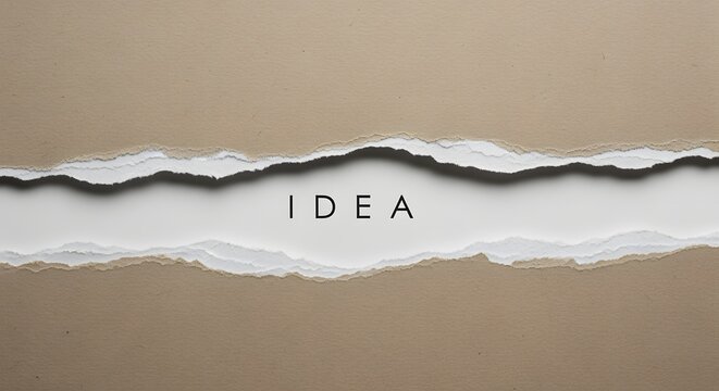 Elegant flat lay background showcasing layered brown craft paper sheets with a central ripped tear revealing the word idea typed inside