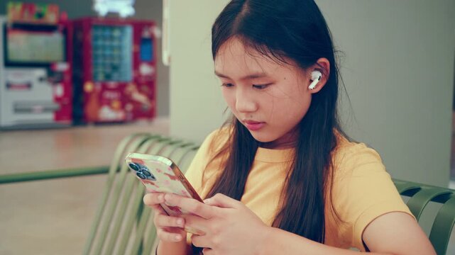 vibrant lifestyle photo of a modern young woman interacting with an artificial intelligence assistant on her smartphone.