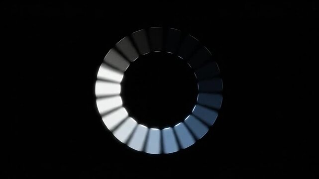 A digital loading circle icon glows against a solid black background
