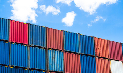 Fototapeta premium Cargo ship container goods export import international transport on blue sky background, warehouse industry business logistics transportation harbor port industrial shipping terminal cargo ship.