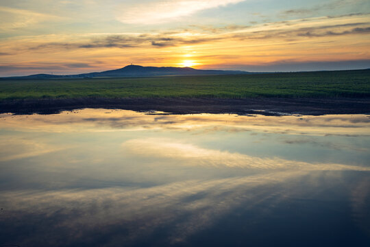 Colour sunrise reflection on the water. 