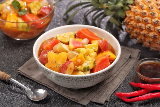 Rujak kweni or rujak aceh is a type of typical Acehnese rujak made from mashed kweni mango with chili, sugar, salt and tamarind juice.
