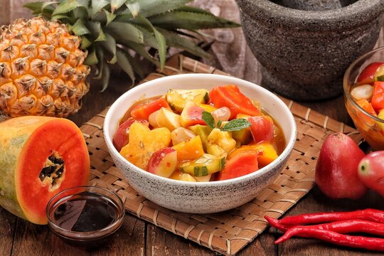 Rujak kweni or rujak aceh is a type of typical Acehnese rujak made from mashed kweni mango with chili, sugar, salt and tamarind juice.
