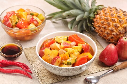 Rujak kweni or rujak aceh is a type of typical Acehnese rujak made from mashed kweni mango with chili, sugar, salt and tamarind juice.
