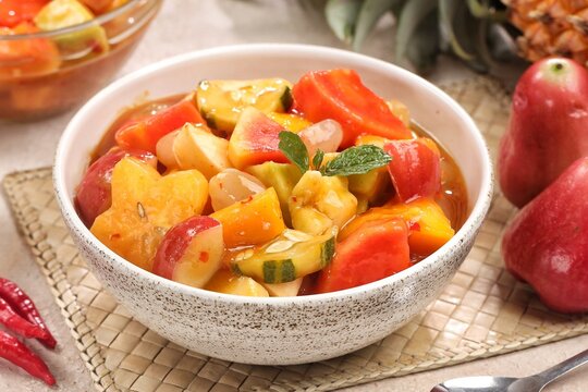 Rujak kweni or rujak aceh is a type of typical Acehnese rujak made from mashed kweni mango with chili, sugar, salt and tamarind juice.

