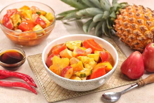 Rujak kweni or rujak aceh is a type of typical Acehnese rujak made from mashed kweni mango with chili, sugar, salt and tamarind juice.
