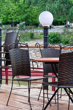 Outdoor Restaurant Cafe Patio Furniture with Wicker Chairs and Wooden Table
