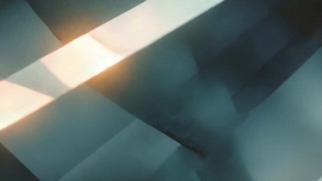 Abstract background featuring geometric pattern creating a dynamic interplay of light, shadow, and shapes, offering a minimalist yet complex visual texture