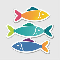 Obraz premium Three Colorful Stylized Fish Stickers