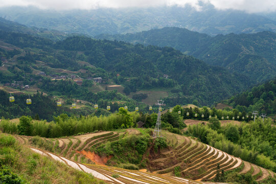 Jinkeng Rice Terraces and Dazhai Cable Car at the Longji Rice Terraces Scenic Area on a sunny day, Longsheng County, Guilin, Guangxi Zhuang Autonomous Region, China