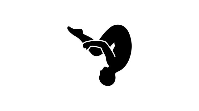 Silhouette of a diver performing a somersault in midair.