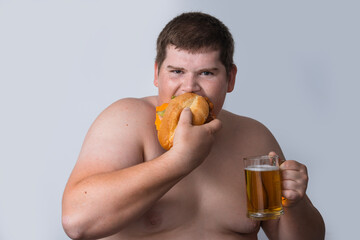Fototapeta premium High calorie diet increases belly fat. Greasy High calorie diet causes weight gain. High calorie diet fuels obesity. Unhealthy High calorie diet adds fat.