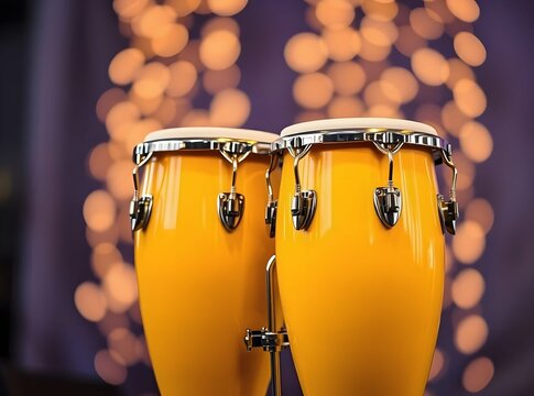 a pair of yellow bongo drums