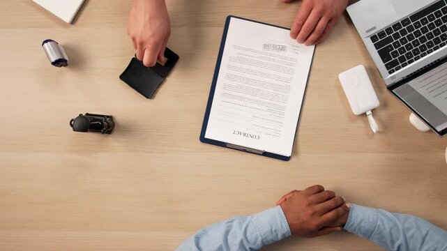 Notary Officer Stamping Property Papers