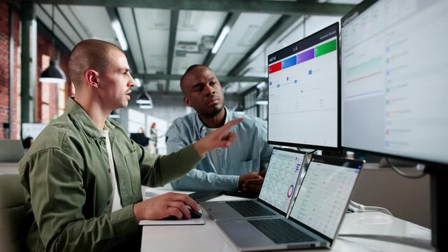 Auditor And Analyst Reviewing System Logs