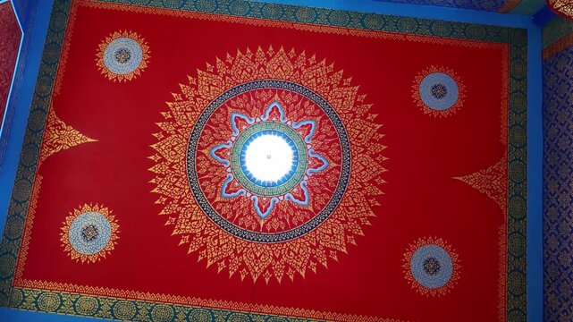 Traditional Thai painting and decoration on the ceiling of Tiger Cave temple buddhist religion art