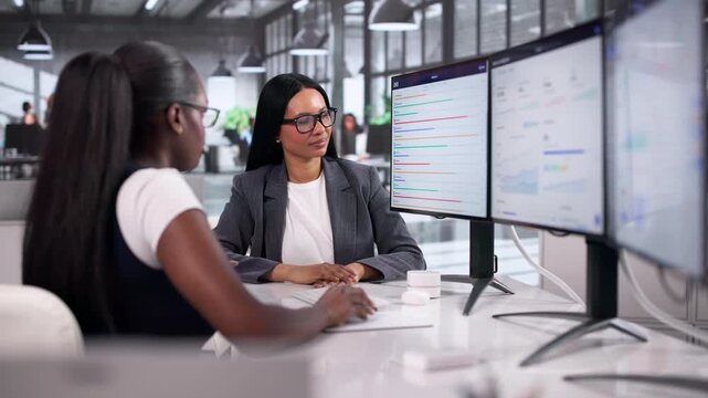 Two Young Women Working Together