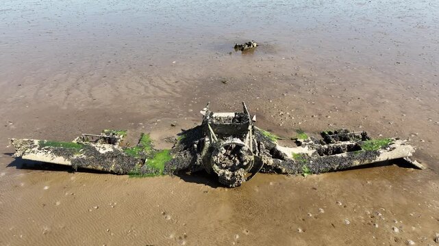 Plane Wreck From 1940s On Lough Foyle Mud Bank At Low Tide