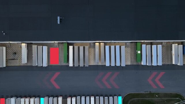Aerial logistics warehouse with AI optimization graphic overlay. Smart trucking, freight automation and analytics concept