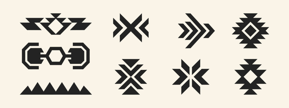 Set of geometric tribal symbols and native ethnic design elements isolated on light background