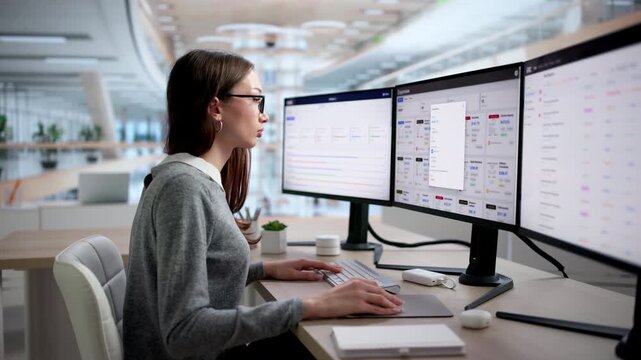 Finance Manager Carefully Tracking Corporate Expenses
