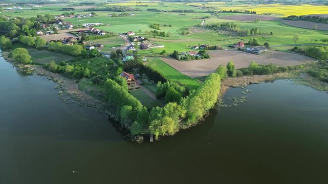Drone Shot of Lake Shore with Trees and Farmland &ndash; 4K ProRes