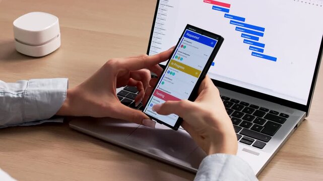 Agile Project Manager Reviews Smartphone Tasks
