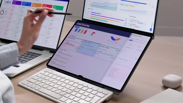 Sales Manager Analyzing Automated Lead Scoring Dashboard
