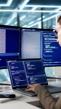 Programmer Writes Code On Desktop Software