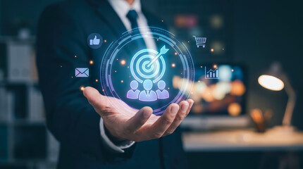 Fototapeta premium Businessman holding digital interface with target, team, and growth icons representing strategy and success
