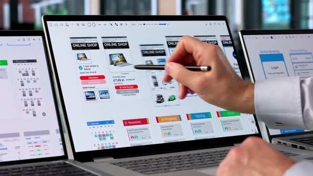 Man Focused On Computer Screen Developing User-friendly App