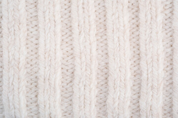 Naklejka premium Cream knit fabric with vertical ribbing texture