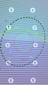 Vertical video: Targeting overlay rotating and locking on as halo profiles entering ring, tracking