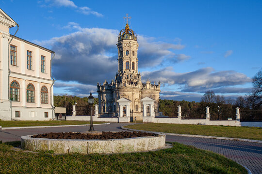 Grand tower rises above serene park grounds