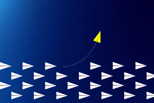 Bright yellow paper airplane leading upward while others follow in creative teamwork and success concept illustration