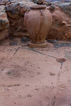 Large Minoan pithos storage jar at the Malia Palace archaeological site in Crete