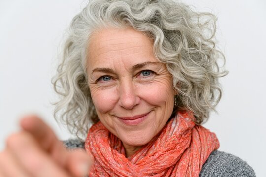 smiling elderly woman with curly gray hair