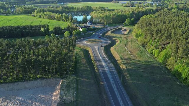 Aerial View of Traffic Roundabout in Green Area &ndash; 4K ProRes