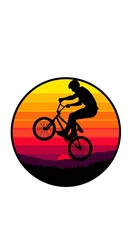Fototapeta premium BMX cyclist silhouette doing a wheelie at sunset with vibrant gradient sky and mountain landscape