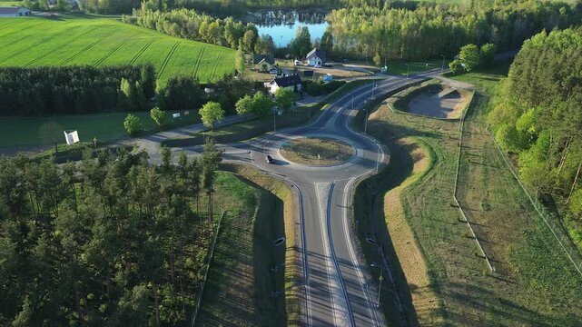 Aerial View of Traffic Roundabout in Green Area &ndash; 4K ProRes