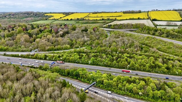 Aerial drone view of M25 Junction 7 / M23 Junction 8 stack interchange at Merstham, Surrey