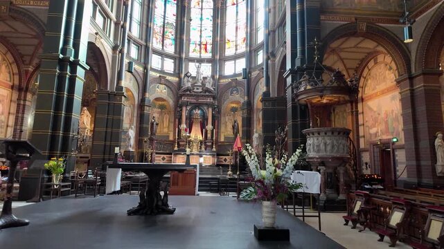 nterior view of the Basilica of Saint Nicholas in Amsterdam, showing the grand Neobaroque architecture