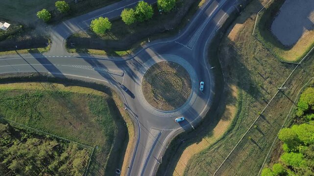 Aerial View of Traffic Roundabout in Green Area &ndash; 4K ProRes