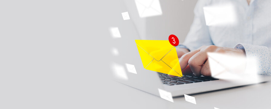 Sending messages while checking email notifications on a laptop